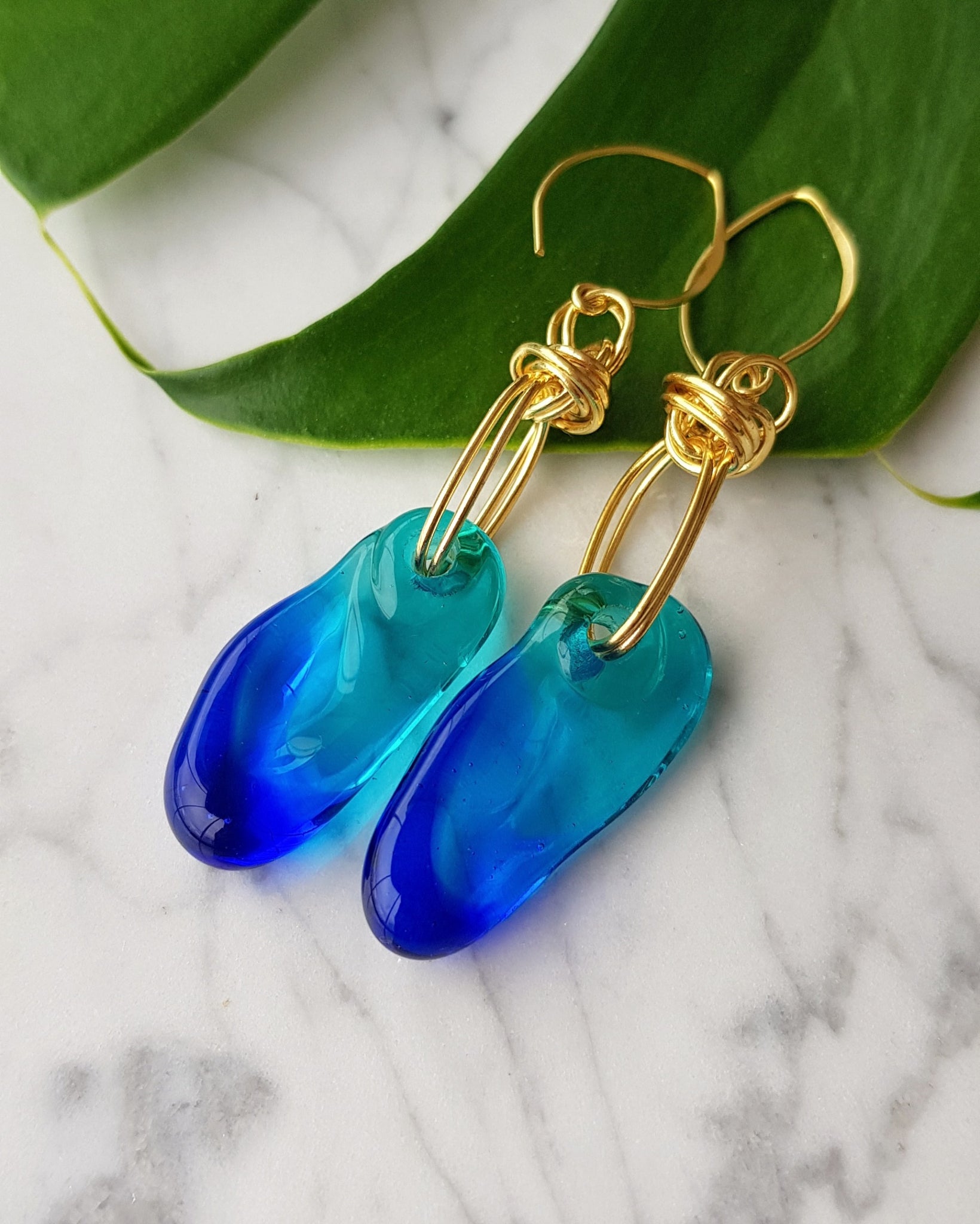 Glass hotsell dangle earrings